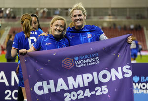 Chelsea's Millie Bright (right) and Chelsea's Erin Cuthbert (left) celebrate as they win the league after the Barclays Women's Super League match at Leigh Sports Village, Manchester. Picture date: Wednesday April 30, 2025.