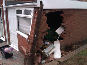 Supporting image for story: Man injured after car ploughed into garage of Kingswinford home