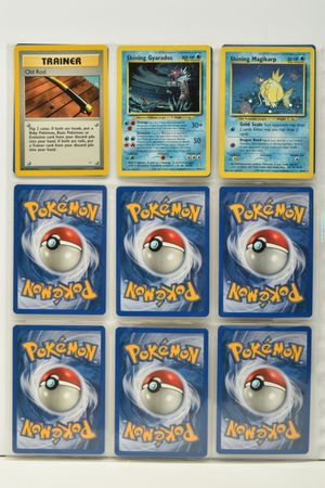 A page from the Neo Revelation set including Shining Gyarados numbered #65/64. 