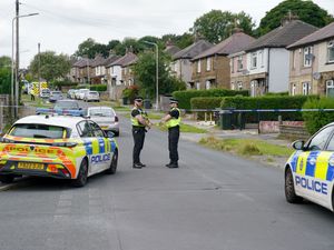 Police at the scene in Westbury Road, Bradford, in August 2024