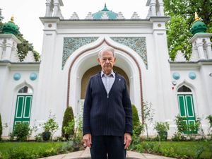 John Hajdu outside the Shah Jahan Mosque in Woking