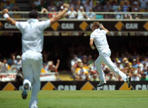 England's Stuart Broad (right) celebrates taking the wicket of Australia's Shane Watson