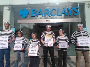 Supporting image for story: Shropshire climate protesters found guilty and fined for chaining themselves inside bank