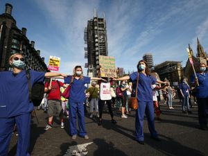 Supporting image for story: In Pictures: NHS workers march on Downing Street to demand pay rise
