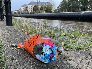 Flowers left by the River Cleddau in Haverfordwest