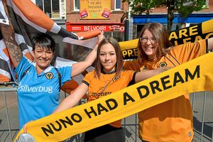 Jo Shortiss, Katie Roberts and Leah Baker wave their scarves in celebration