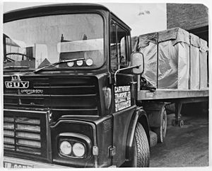 Four Wolverhampton firms in use: a Guy lorry, fitted with a Thompson trailer, carrying Chubb safes and cabinets for France and Switzerland, using the haulier Cartwright Transport. January 1969