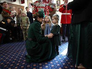 Supporting image for story: Kate delights little girl as she celebrates St Patrick’s Day with Irish Guards