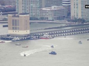 An aerial image taken from video shows rescue vessels on site of helicopter crash on the Hudson River in New York