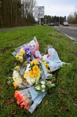 Flowers left at the scene of Tuesday's crash