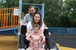 Amelia with mum and dad Charlotte and Dave