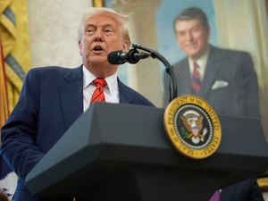 President Donald Trump speaks in the Oval Office