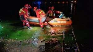 Ellesmere firefighters used a boat to reach the man. Picture: Ellesmere Fire Station.
