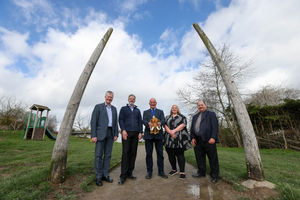 Richard Woolley, left, Grant Wilson, Councillor David Mills, Tammy Shurmer and Councillor David Evans (right) between the tusks at Shropshire Hills Discovery Centre, Craven Arms 