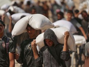 Supporting image for story: At least 27 people seeking food killed by Israeli gunfire, health officials say