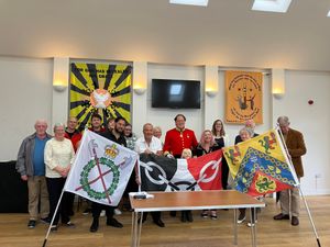 Supporting image for story: Flags exchange a part of memorial climb for society