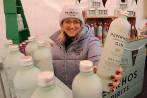 Harriet Evans of Penrhos Gins showing off some of their huge range including dry gin, rhubarb, apple and elderberry, raspberry, strawberry and pear and chilli in collaboration with Oddbox. Most of the fruit is grown on Herefordshire farms and the gins are available from their online shop, Oakchurch and from Penrhos Farm. Image by Andy Compton