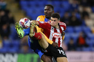 Toto Nsiala of Shrewsbury Town and Sonny Cox of Exeter City (AMA)