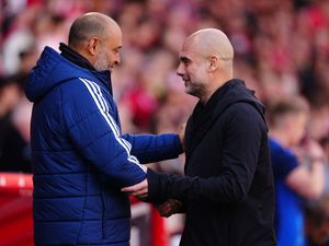 Nottingham Forest manager Nuno Espirito Santo and Manchester City boss Pep Guardiola shake hands before a game