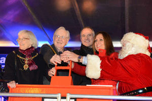 Switching on the Christmas lights, (left-right) mayoress of Wolverhampton Frances Heap, Mayor of Wolverhampton Michael Heap, Steve Bull MBE, Charles Clark Toyota representative Dawn Holmes, and Santa Claus (Brian Tranter, from Tettenhall Rotary Club, at Upper Green, Tettenhall.