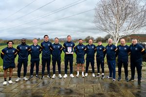 Shrewsbury Town boss Gavin Cowan with his back room staff and the League Two Manager of the Month award. Picture: Shrewsbury Town 