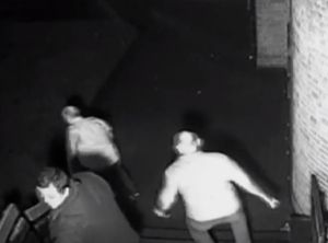 People rush from the venue to help the youngster