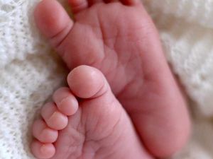 Supporting image for story: Should Britain ban baby ear piercings?