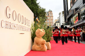 The Coldstream Guard brass band march past one of Merrythought's giant teddy bears
