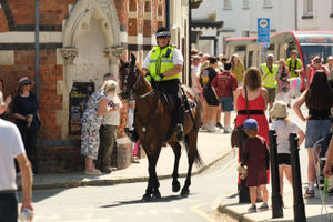 Huey the Police Horse with Special Constable George Giles led the parade from the Memorial Hall through the high street to Went’s Meadow. Image Andy Compton