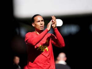Virgil van Dijk claps the fans