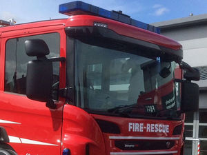 Supporting image for story: Woman rescued after car crashes into garage at Telford house