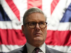 Sir Keir Starmer in front of a Union flag