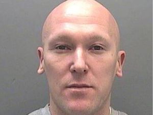 Supporting image for story: Robber wanted on recall to prison