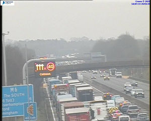 One lane of four has closed on the M6 between Junction 13 and Junction 12 due to a crash between a lorry and car