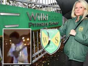 Supporting image for story: WATCH: Hammer vandals smash up school sign and car windows