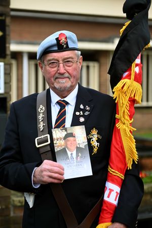 Gil Mould, a fellow former soldier, pays his respect to Stafford veteran Roger Southern.