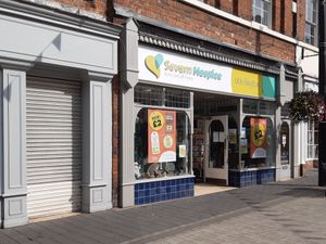 Supporting image for story: Charity wins appeal over shop signs