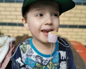 Owen Radford tucking into a marshmallow