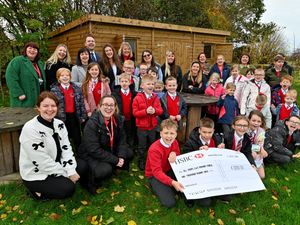 Supporting image for story: 'It's amazing to get this project off the ground': Staffordshire school receives £1,000 cheque to help with building crucial outdoor learning space