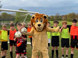 Lenny the Bridgnorth Lions mascot and some of the Spartans 