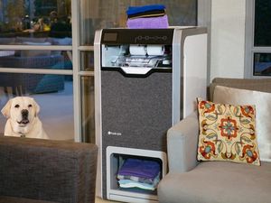 Supporting image for story: This new machine that folds your laundry is quite possibly the best invention ever