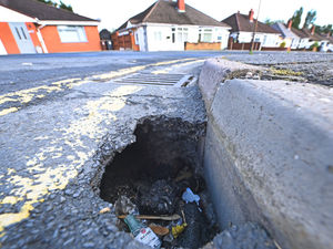 Supporting image for story: Suspected sinkhole in Wolverhampton street prompts concerns for safety of children and dog walkers