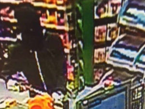 Supporting image for story: CCTV: Terror as masked knifeman robs Shropshire petrol station