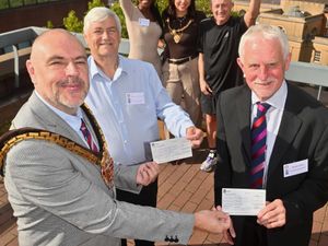 Supporting image for story: 'We are so grateful' - thousands of pounds handed over after incredible 19,000 laps of Wolverhampton stadium completed in Rotary's Best Foot Forward event