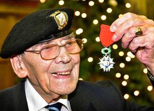Veteran Jack Hill with his medal