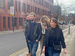 Ex England player Danika Priim (centre) leaves Leeds Crown Court (Tom Wilkinson/PA)