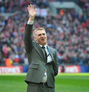 Dean Smith waves to the fans