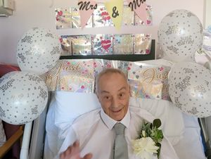Supporting image for story: Father of the bride’s hospital bed wedding wish comes true