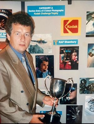 Ian with one of his many photography trophies