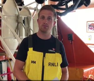 The stamps are gratefully accepted by Owain Williams, Coxswain of Porthdinllaen RNLI lifeboat